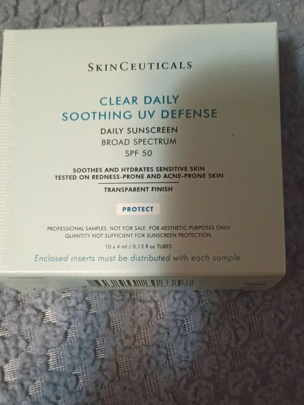 SkinCeuticals Clear Daily Soothing UV Defense SPF 50 - White and Blue Text